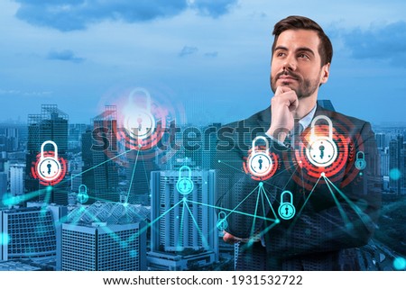 A young Caucasian cybersecurity developer thinking about new concepts at security compliance division to protect clients confidential information. IT lock icons over Singapore background.