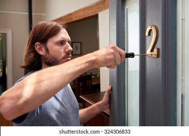 Young Caucasian Diy Handy Do-it-yourself Man At Home Fixing Things Up In The House