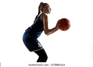 Young caucasian female basketball player of team in action, motion in run isolated on white background. Concept of sport, movement, energy and dynamic, healthy lifestyle. Training, practicing. - Powered by Shutterstock