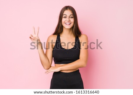 Similar – Image, Stock Photo Two fit women doing sports together, using a medicine ball to tone their body. Urban scene.