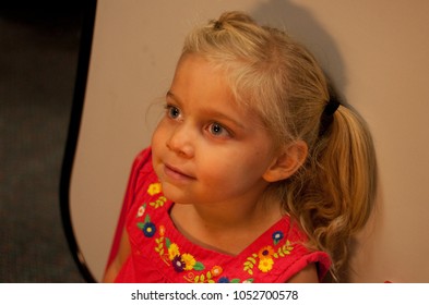 Young Caucasian Girl Child Smiles For Passport Photo