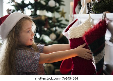 Young Caucasian girl enjoying Christmas holiday