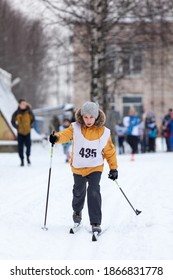 Young Caucasian Girl Running Cross-country Ski At A Competition, Winter Activities