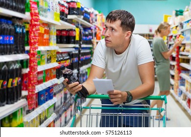 Young Caucasian Guy Supermarket Looking Into Stock Photo 575126113 ...