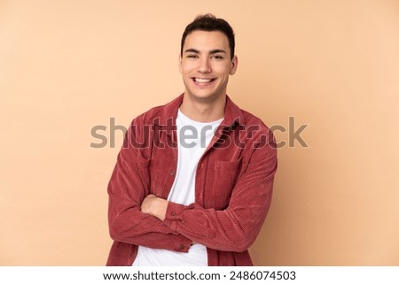 Similar – Image, Stock Photo Handsome young man with stylish haircut. Portrait of teen boy with youth hairstyle is standing on grey background.