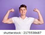 Young caucasian happy sporty fitness man 20s show biceps muscles hand isolated on bright color background studio portrait