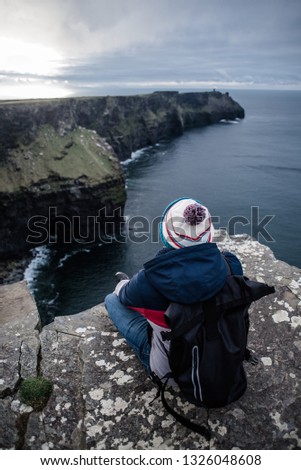 Similar – Ireland, Cliffs of Moher, woman, hiking