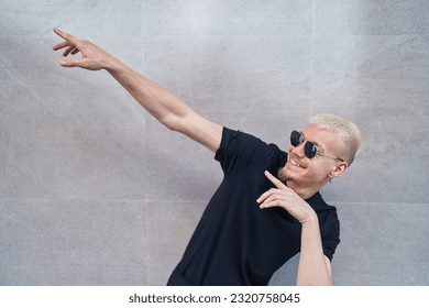 Young caucasian man smiling confident pointing with fingers to the sky over isolated white background - Powered by Shutterstock