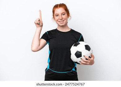 Young caucasian reddish football player woman isolated on white background pointing up a great idea - Powered by Shutterstock