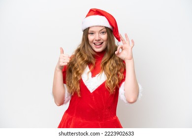 Young Caucasian Woman With Christmas Dress Isolated On White Background Showing Ok Sign And Thumb Up Gesture