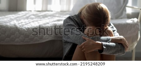 Similar – Baby sleeping on a blanket while her mother looks