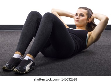 Young Caucasian Woman Doing Situps/crunches