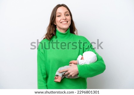 Young caucasian woman with her cute baby isolated on white background smiling a lot
