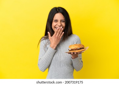 Young Caucasian Woman Holding Burger Isolated Stock Photo 2007319175 ...