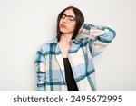 Young caucasian woman isolated on white background tired and very sleepy keeping hand on head.