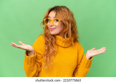 Young caucasian woman isolated on green screen chroma key background With glasses and having doubts - Powered by Shutterstock