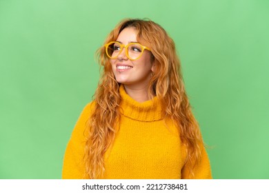 Young caucasian woman isolated on green screen chroma key background With glasses with happy expression - Powered by Shutterstock