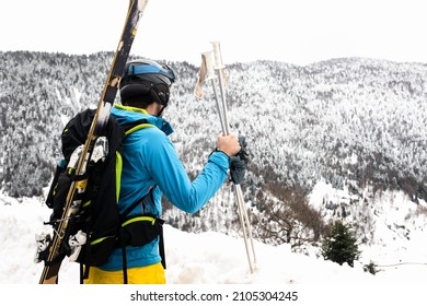 Young Caucasian Woman Looking A Winter Landscape After A Heavy Snow Storm On The Pyrenees.