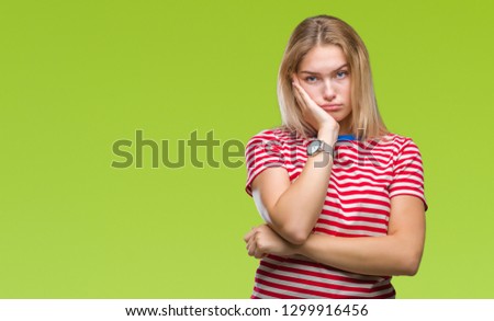 Young caucasian woman over isolated background thinking looking tired and bored with depression problems with crossed arms.
