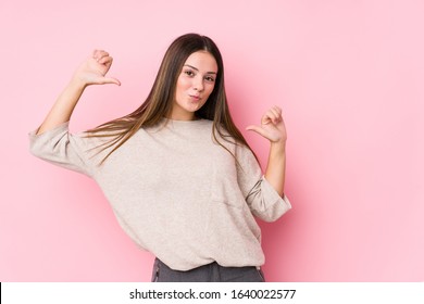 Young caucasian woman posing isolated feels proud and self confident, example to follow. - Shutterstock ID 1640022577