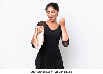 Young caucasian woman practicing ballet isolated on white background celebrating a victory - Powered by Shutterstock