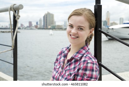 Young caucasian woman smiling in Manila Bay, Harbour Square