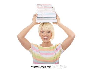Young caucasian woman (student) with books on her head - looking up