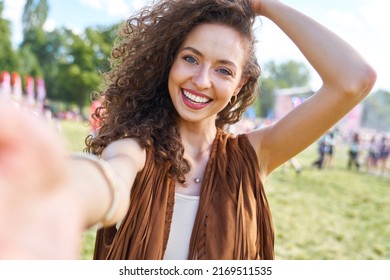 Young caucasian woman taking selfie during music festival - Shutterstock ID 2169511535