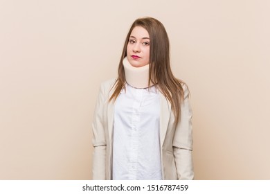 Young Caucasian Woman Wearing A Cervical Collar