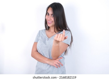 Young Caucasian Woman Wearing Grey T-shirt Over White Background Beckoning Come Here Gesture With Hand Inviting Welcoming Happy And Smiling