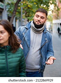 Young Charismatic Bearded Man Trying To Pick Up Stranger Woman On Street..