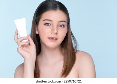 Young charming girl with natural beauty, perfect smooth skin hold lotion, cream, moisturizer tube. Beautiful girl show skincare product smiling on isolated background. - Powered by Shutterstock