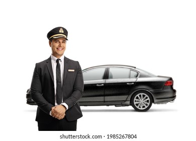 Young Chauffeur Standing In Front Of A Black Car Isolated On White Background