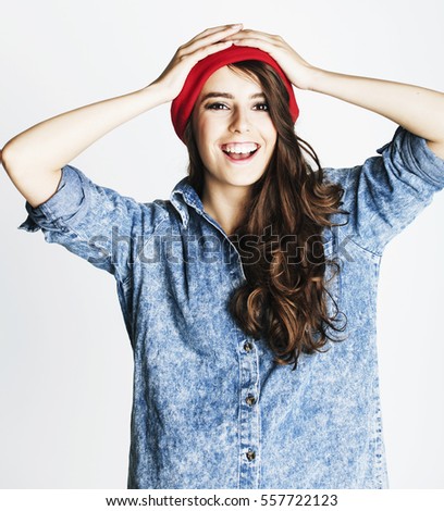young cheerful brunette teenage girl on white background