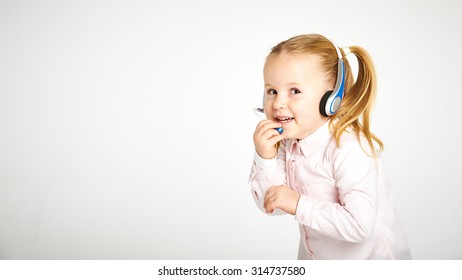 Young cheerful female customer support operator with headset and smiling - Powered by Shutterstock