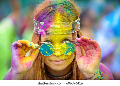 Young Cheerful Woman At Holi Paint Party