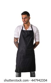 Young Chef Or Waiter Wearing Black Apron Isolated