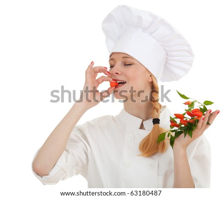 young chef woman trying to eat chilli, pepperoni