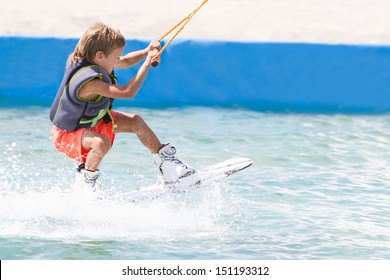 Young Child Boy Wake Boarding