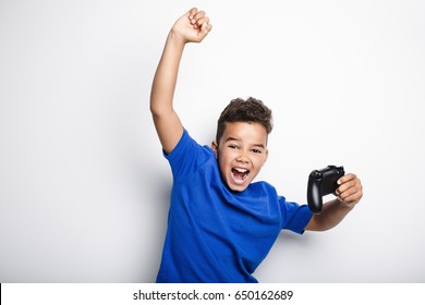 A Young Child Having Fun Playing Video Games