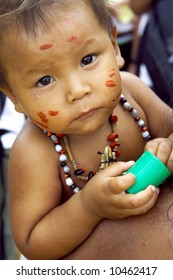 A Young Child Photograph Taken In An Amazonian Tribe.