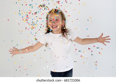 Young Child Throwing Confetti