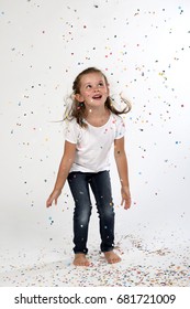 Young Child Throwing Confetti