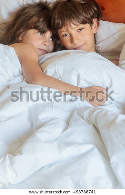 boy girl in bed