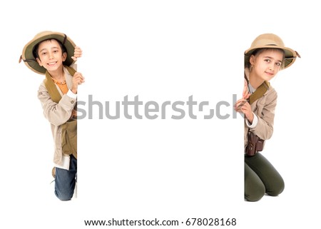 Young children playing Safari isolated in white