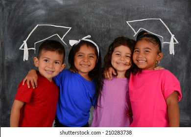 Young children at school standing at the chalkboard - Powered by Shutterstock