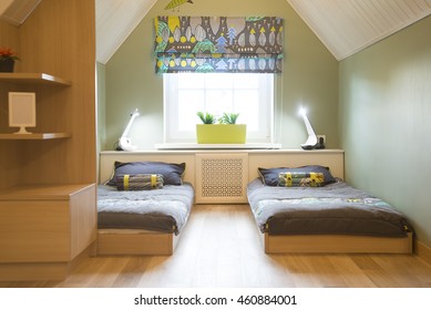 Young Child's Bedroom. Bright Children Room Trend. Large Bright Space With Big Window And Dark Curtain, Green Plant And Cupboard. Modern Stylish Design