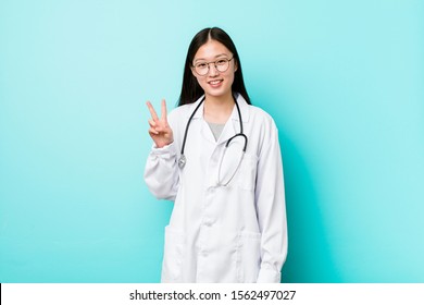 Young Chinese Doctor Woman Showing Victory Stock Photo 1562497027 ...