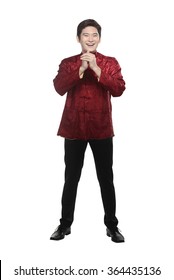 Young Chinese Man In Cheongsam Suit Isolated Over White Background