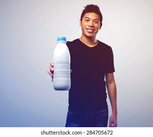 Young Chinese Man Drinking Milk